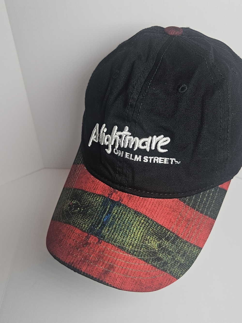Nightmare on Elm Street Black Cap with Red & Green Striped Brim
